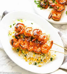 Uncooked shrimp tossed and marinated in honey, garlic, butter and seasonings. Marinated Grilled Shrimp Immaculate Bites