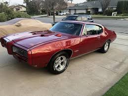 Image result for Medium Red 1965 Barracuda