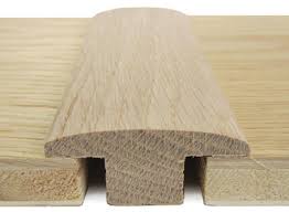 These thresholds are made of long lasting anodized aluminum and features a composite base, which will wear for years and years. Solid Oak T Bar Real Wood Threshold 1 8m Long