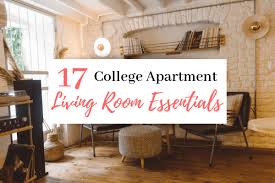 A living room in light taupe and ivory with side tables in varying shades of wood from a dark finish to a more natural oak. College Apartment Living Room Ideas 17 College Apartment Living Room Essentials