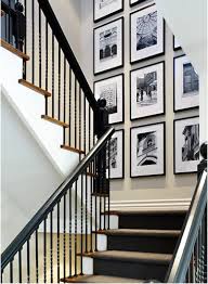 It S Written On The Wall How To Design A Photo Wall The Easy Way Tall Wall Decor Stairway Photos Photo Decor
