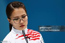 Switzerland's Marlene Albrecht reacts during the curling women's... News  Photo