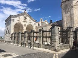 Statue of saint michael overlooking the entrance of the sanctuary. Arte E Fede Recensioni Su Santuario Di San Michele Arcangelo Monte Sant Angelo Tripadvisor