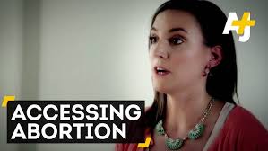 Pro-choice campaigner outside Belfast abortion clinic