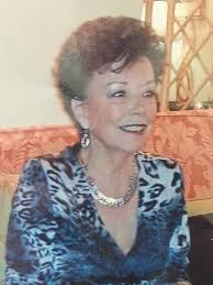 This picture of my late mum, please can you make the photo sharper and  change the background to a complimentary plain colour? Thank you so much!