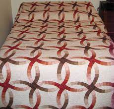Double Wedding Ring Quilt I Love The Flow Of Colors And How It Adds To The Optical Illusion Double Wedding Ring Quilt Wedding Ring Quilt Double Wedding Rings