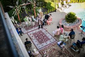 Maybe you would like to learn more about one of these? Ca Outdoor Bay Area Wedding Photo Showing The Ornate Rugs Lining The Aisle And The Bright Blue Water Of The Pool Beside The Guests Wedding Photojournalist Association
