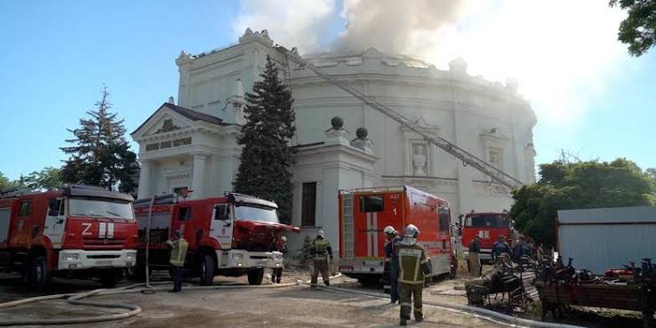 Emergency response personnel at the site of a vehicle explosion in Sevastopol, Crimea.