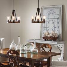An amazing design that can make your dining room looks engaging for your best time with your family. Kichler Barrington 3 Light Distressed Black And Wood Tone Rustic Chandelier Lowes Com Dining Room Light Fixtures Wood Dining Room Dining Room Chandelier