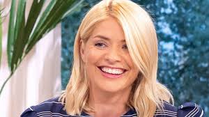 Holly Willoughby wears a ruffle top by People Tree and trousers by French  Connection