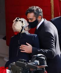 Watch lady gaga perform the national anthem at president joe biden's inauguration ceremony in washington, d.c. See Lady Gaga And Her Boyfriend Michael Polansky Kissing At The Inauguration