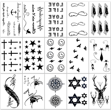 Small kitty cat tattoo behind the ear. Hakuna 15 Sheets Temporary Tattoos Small Size Body Art Stickers Most Popular Fake Tattoo Designs As Cross Star Letters Butterfly Compass Bird Cat Feather Etc Buy Online In Antigua And Barbuda At Antigua Desertcart Com Productid 38532652