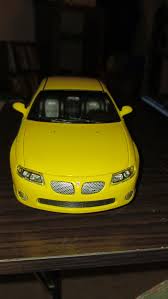 Image result for Yellow 2004 Pontiac