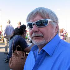 Why do cities like Albany have school zone cameras but no crossing guards?