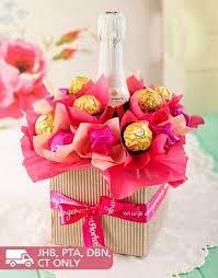 Check spelling or type a new query. Pink Sparkling Chocolate Arrangement Nice Gift Idea Winegifts Gifts Chocolate Arrangements Diy Gifts