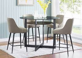 Complete your dining room, restaurant or patio with this chic bar table and chair set. Olson Grey Round Glass Top Counter Dining Set W 4 Chairs Ivan Smith Furniture