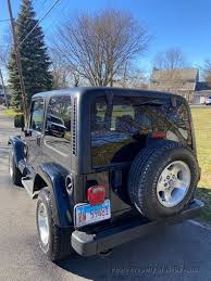 Image result for Brilliant Black 2002 Jeep