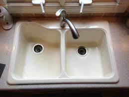 It can't stand up to anything. Kitchen Bathroom Sink Refinishing Reglazing Services