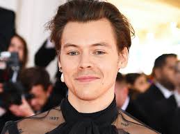 Harry styles' left arm tattoos. Photos Of Harry Styles Dressed As Ariel Are Causing A Stir Online