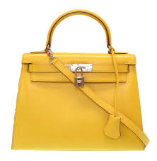 The bag was redesigned several times before it was popularized by and then named. Hermes Vintage Tadelakt Kelly 28 Bag Yellow Leather And Calf Handbag Luxury High Quality Avvenice