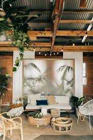 White Chairs Table And Palm Print Wall Tropical Living Room Tropical Home Decor Tropical Interior