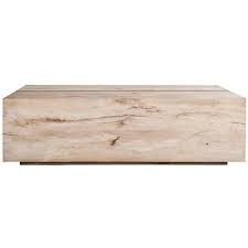This coffee table has an understated style that's sure to make a statement in your living room. Taracea Tacto Solid Wood Block Coffee Table Stone Coffee Table Wood Wood Blocks