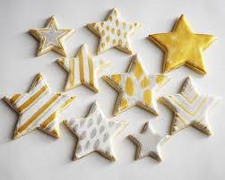 Prep a thin royal icing, place it in a shallow bowl, then dip the top of your cutout cookies into the icing—done! Metallic Star Cookie How To Cakegirls