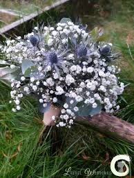 What kind of protea to use in a wedding bouquet? Gypsophila And Thistle Bouquet Laurel Weddings