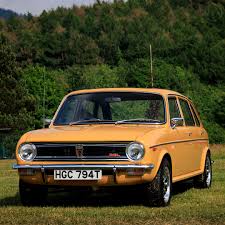 Image result for Herald Yellow 1976 Subaru