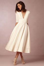 Simple Wedding Gowns For The Minimalist Bride Modern Wedding Tea Length Wedding Dress Tea Length Dresses Midi Dress Party