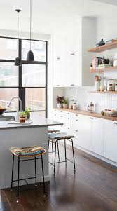 White cabinets and butcher block countertop. 54 White Cabinets With Butcher Block Countertops Timeless Look