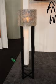 New Designs Make Table Lamps And Floor Lamps More Desirable 954bartend Info A floor lamp with a tree stump slice as a base and a branch as a rod.