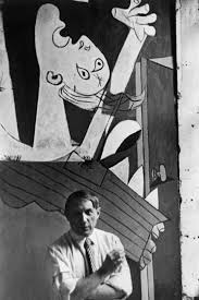 Like so many famous works of art, the meaning of picasso's guernica is not immediately clear and left wide open to analysis and interpretation. David Seymour Spanish Painter Pablo Picasso In Front Of His Painting Guernica At Its Unveiling At The Spanish Pavilion Of The International World Fair Held Six Weeks After The Aerial Bombing