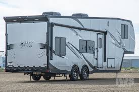 The toy hauler, or toy box, as they are sometimes called, also has the option of turning the garage space in the rear into additional living space so we carry a wide variety of fantastic toy hauler fifth wheels for sale as well as our toy hauler travel trailer for sale so we can match you with whatever. Fifth Wheel Toy Haulers Iws Trailers