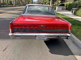 Image result for Antigua Red 1965 AMC