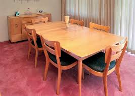 It is the extension table#163 with 14 leaf and original pads for the entire top of the table! More Pushy Furniture