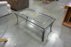 Here's how you add a tile tabletop to your old and ugly coffee table: Tile And Glass Top Coffee Table