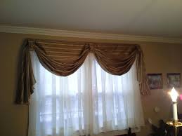Fold the curtain fabric in half, with the right sides together and the raw edges facing to the left. Pin On Sewing