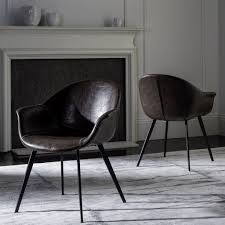 A New Design Classic This Contemporary Tub Dining Chair Was Inspired By The Shard S Of Black Leather Dining Chairs Leather Dining Chairs Upholstered Arm Chair