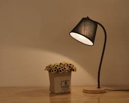 Living rooms require soft lighting to create an inviting atmosphere for your guests. China Nordic Simple Table Lamp With Wooden Taste China Table Lamp Table Light