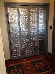 Do You Have Unattractive Louver Doors Try This Update Using Tin Panels Now It Will Be Cheaper To G Glass Closet Doors Diy Closet Doors Bifold Doors Makeover