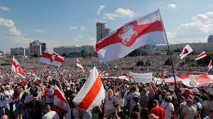 A woman shouts as she holds a belarus flag during a protest against police violence at recent rallies of opposition supporters. Belarus Protests Eclipse Rally In Defense Of Defiant Leader The New York Times
