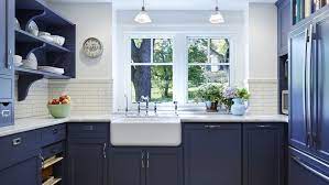 A navy blue border around the edge of a white kitchen goes a long way to lift the colour scheme without overwhelming the look. Beautiful Blue Kitchen Cabinet Ideas