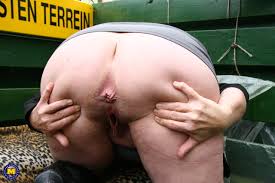 Naughty mature naturist masturbating outside - Mature.nl