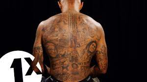 This means the average man needs the englishman's body is a shrine for tattoos, the artwork on his back carries political meaning his. Andre Gray Breaks Down His Black History Tattoos Youtube