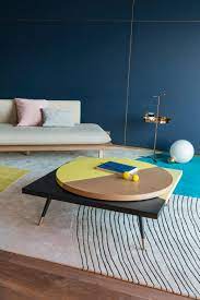 This lazy susan oval mid century coffee table blends a design that can be easily use in both modern and transitional settings. Lazy Susan Coffee Table Blue Indigo Architonic