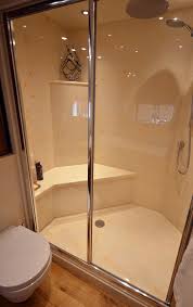 We chose the 48″ x 48″ x 3/4″ fundo ligno. Langley Interiors Large Marble Walk In Shower With Built In Seat In Marble Finish Autumn Onyx From Versital Langley Interiors