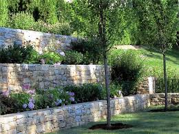 Garden Lo In 2020 Stone Walls Garden Sloped Backyard Landscaping Retaining Walls