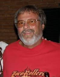 My brother in law is Garry Kelley. I am looking for pictures of him during  his school years. I saw the one of his 8th grade graduation.