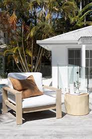 Uniqwa Furniture Collection S Trunk Side Table And Mozambique Occasional Chair Looking Stunning In This Coastal Outdoo Home Patio Furniture Sets Outdoor Living